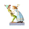 A hand-painted figurine depicting Wendy and Peter Pan about to share a kiss, with Tinker Bell above them, from the Jim Shore Disney Traditions series.