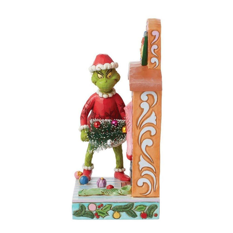 Grinch by Jim Shore - Grinch Pushing Tree Up Fireplace