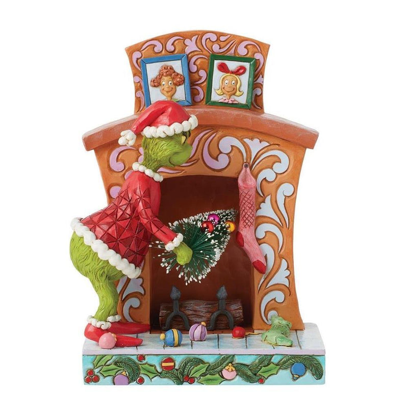 Grinch by Jim Shore - Grinch Pushing Tree Up Fireplace