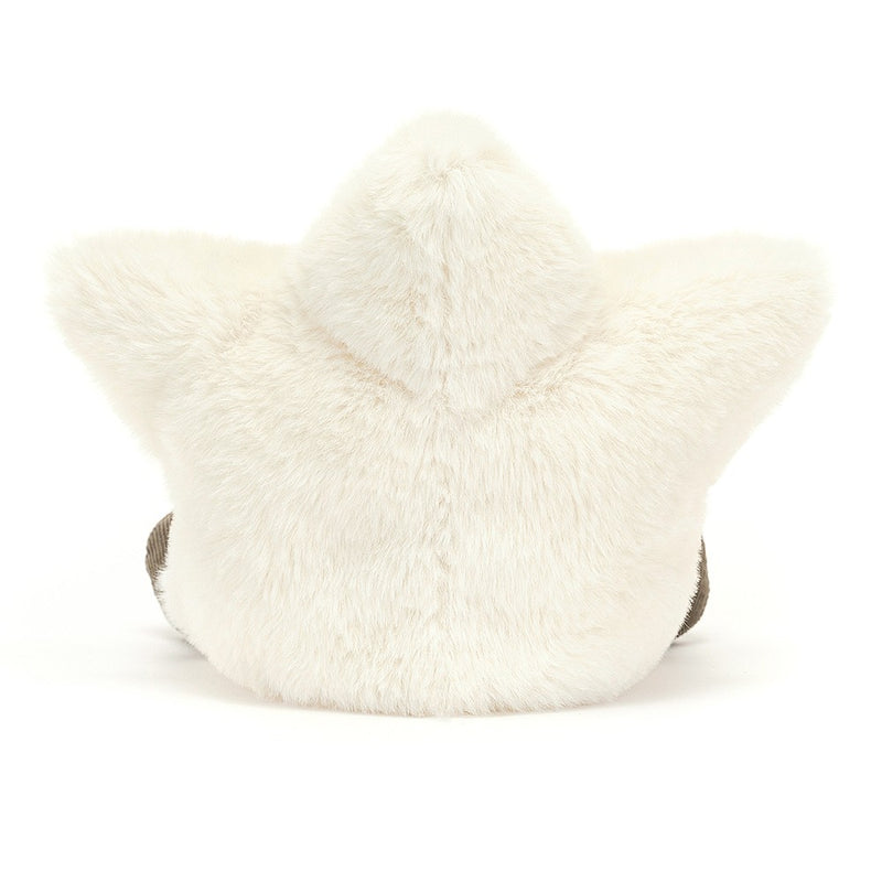 The back view of a soft, white plush star toy is shown, emphasizing its fluffy texture. The base displays a hint of gray corduroy material.