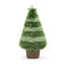 A fluffy green Christmas tree toy with a beige star on top, seated on a textured brown base.