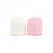A pair of plush marshmallows, one pink and one white, connected by a satin ribbon. Both have cute facial features, praline corded boots, and blushed cheeks, symbolizing friendship and togetherness.