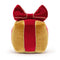 A soft, golden gift box plush toy from Jellycat with a cranberry ribbon, featuring a cheerful smile and cord boots. 