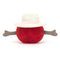 A red plush toy cricket ball with a white sunhat on top and two brown protruding arms on its sides.