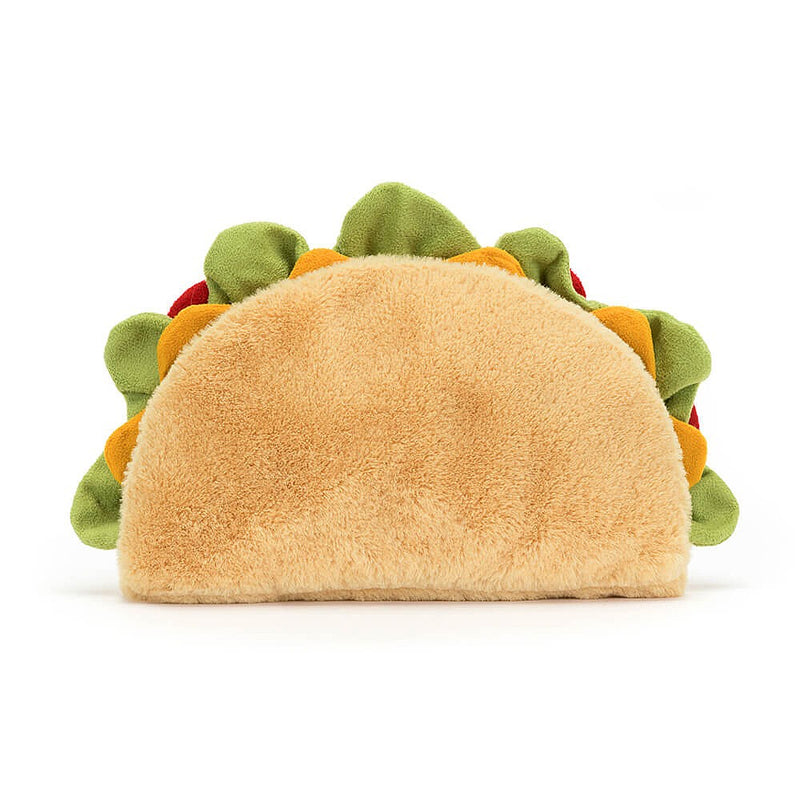 A colorful and vibrant Jellycat Amuseable Taco plush toy, featuring a tactile shell, soft suedey lettuce, tomato details, and cute cordy booties.