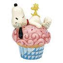 Peanuts by Jim Shore - Snoopy Laying on Cupcake
