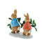 Photo from the back: Figurine of Peter Rabbit and Flopsy carrying the leaves