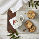 Display Royal Worcester Wrendale Designs - Fine Bone China Robin Mug on a kitchen table with cookies
