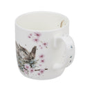 Royal Worcester Wrendale Designs Budgie Mug -  Feather Your Nest, two nestlings in the nest with pink flowers.