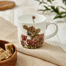 Royal Worcester Wrendale Designs Cow Mug, display on the kitchen table with some muesli bar
