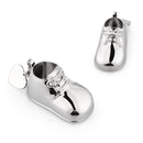 Features an engraving plate the fits on the sole of the shoe plus a detachable heart pendant.
